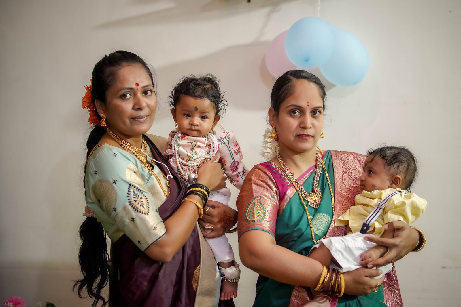 Elders blessing the child during the naming ceremony