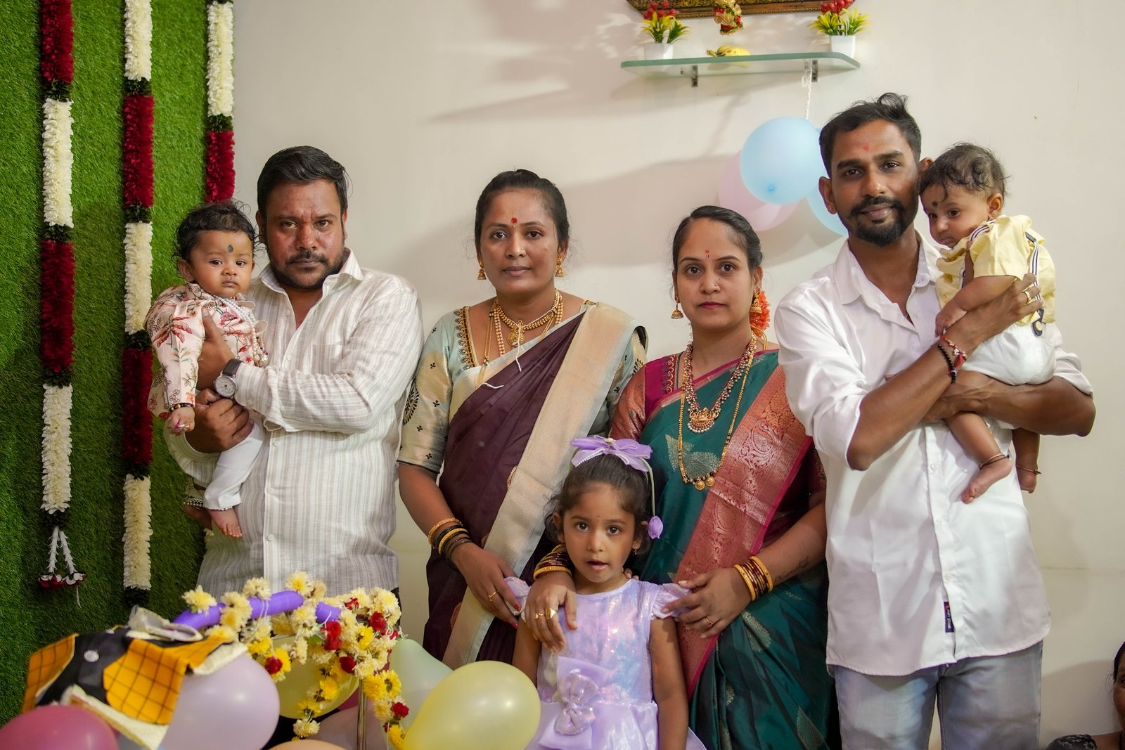 Candid family moments at the naming ceremony